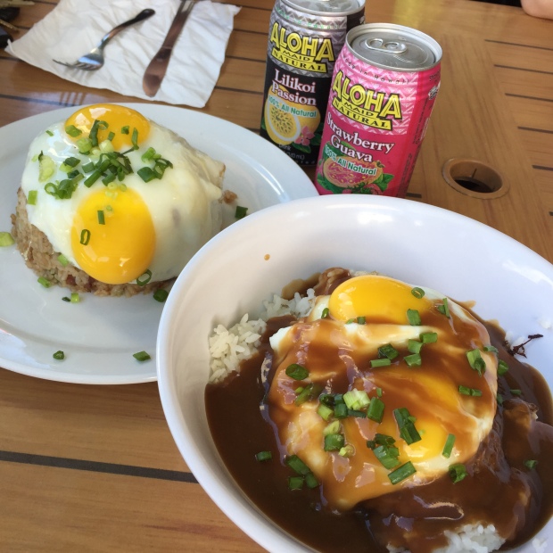 Pork fried rice and loco moco, a Hawaiian rice plate topped with a hamburger patty, fried egg, and gravy.